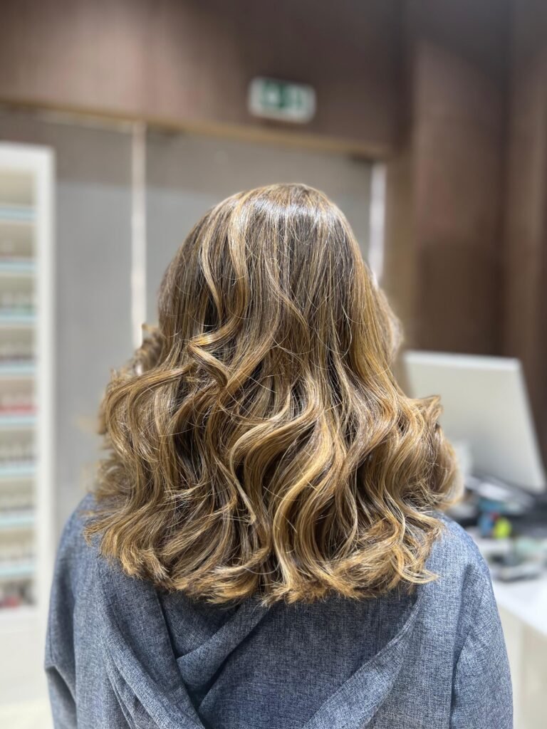 Balayage and soft waves by Zuri Beauty Lounge, Jumeirah